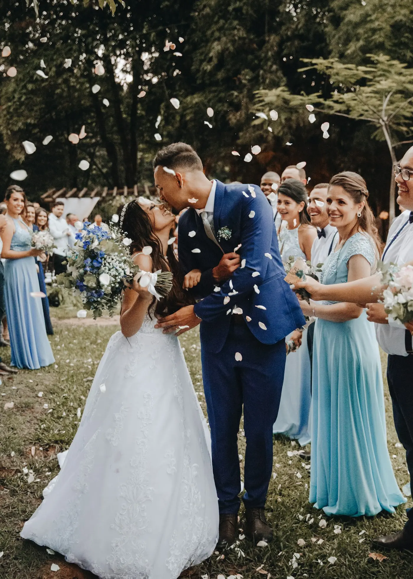 A couple celebrating as confetti falls around them